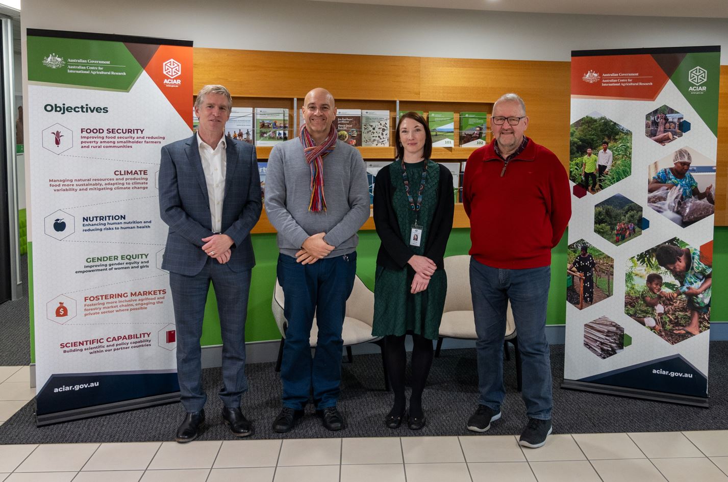 Project leader from UniSC, Professor Patrick Nunn (right) with ACIAR Research Program Manager, Water, Dr Neil Lazarow (centre left) with Lincoln University's Professor Tim Smith (left) and ACIAR Research Program Support Officer, Water, Laura Martin (centre right) at ACIAR House in Canberra.