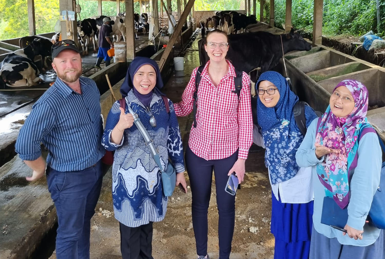 Researchers from the IndoDairy2 project team at a milk cooperative site in West Java as part of the project proposal development. David McGill (CQU), Sahara (IPB), Jenny Hanks (CQU), Yanti (IPB) and Dewi (ICASEPS). 