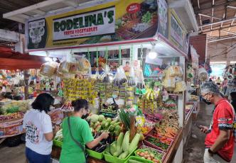 Rodelina’s Fresh Vegetable stand selling PhilGAP certified vegetables at the Baybay markets, Leyte.