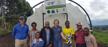 Irene Kernot, centre, with researchers and farmers taking part in an ACIAR-supported sweetpotato project in Papua New Guinea. Photo: ACIAR