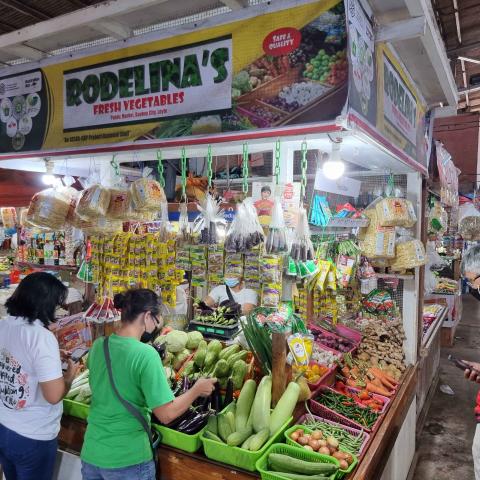 Rodelina’s Fresh Vegetable stand selling PhilGAP certified vegetables at the Baybay markets, Leyte.